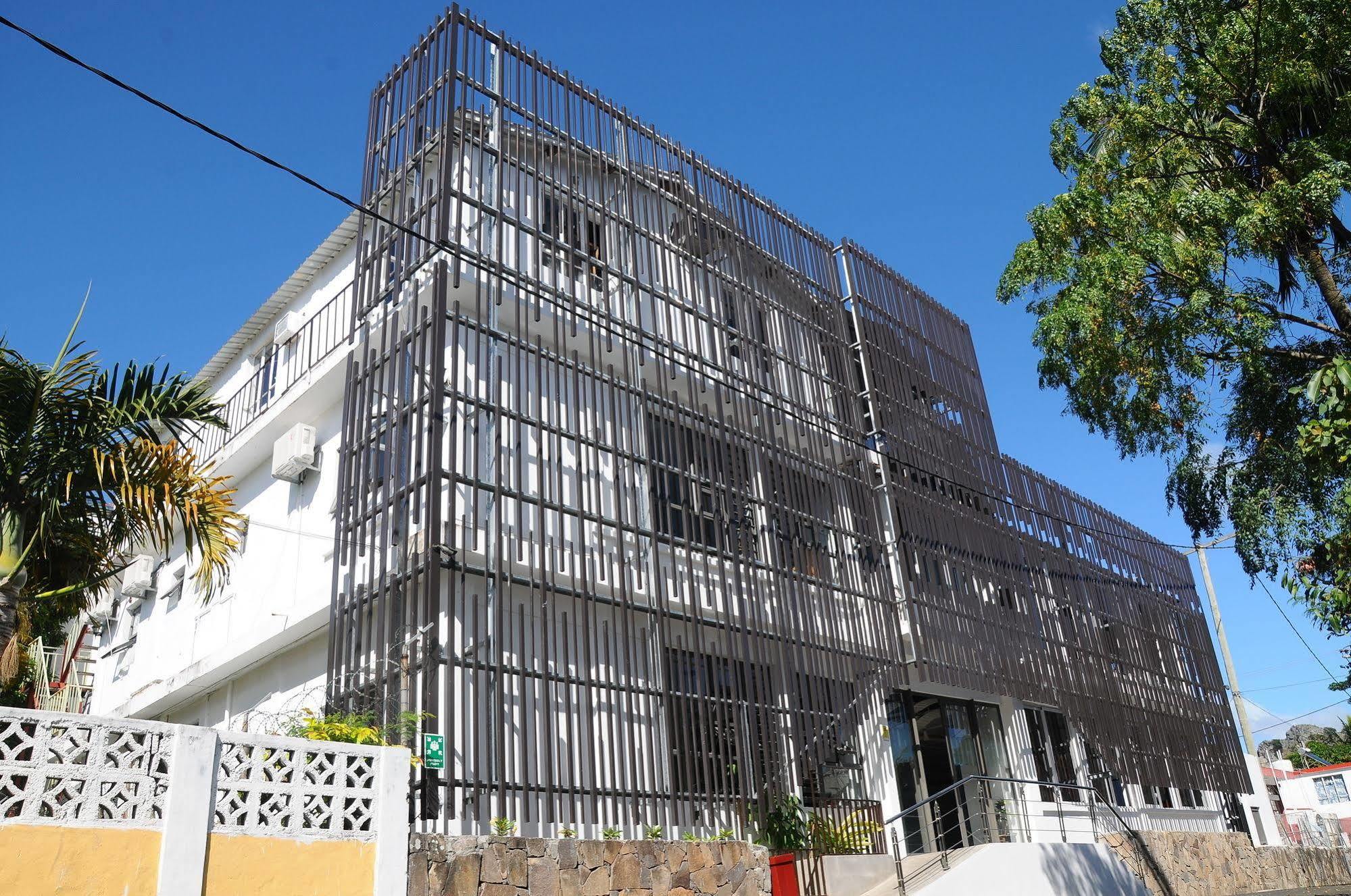 Le Flamboyant Hotel Port Mathurin Bagian luar foto